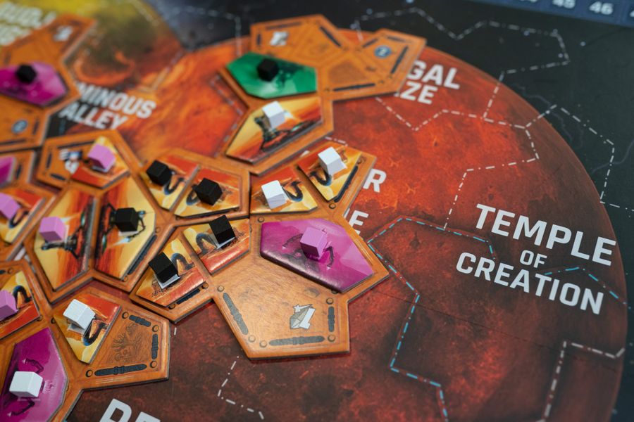 Collision Point resource tokens and polyomino tiles close-up