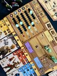 Player board with tucked in cards