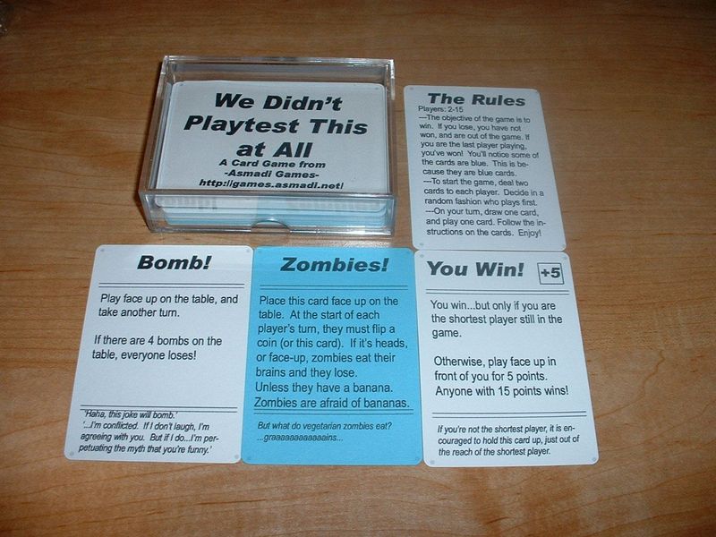Beta Version game box and rules, plus a couple of cards from the game.