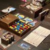 Upgraded Premium Edition with a painted dispenser, custom marbles, a playmat, a custom 3D insert made with wood filament and a complete and compact 4-player rulebook for the base game, all expansions, and promos.