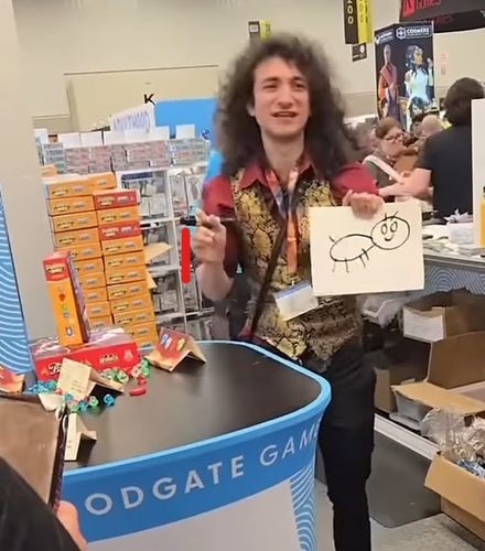 Michael OJ - the magician hired to do closeup magic at the booth for Squirrel Away