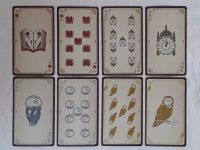 Aces and Nines of the four suits: Books, Clocks,…