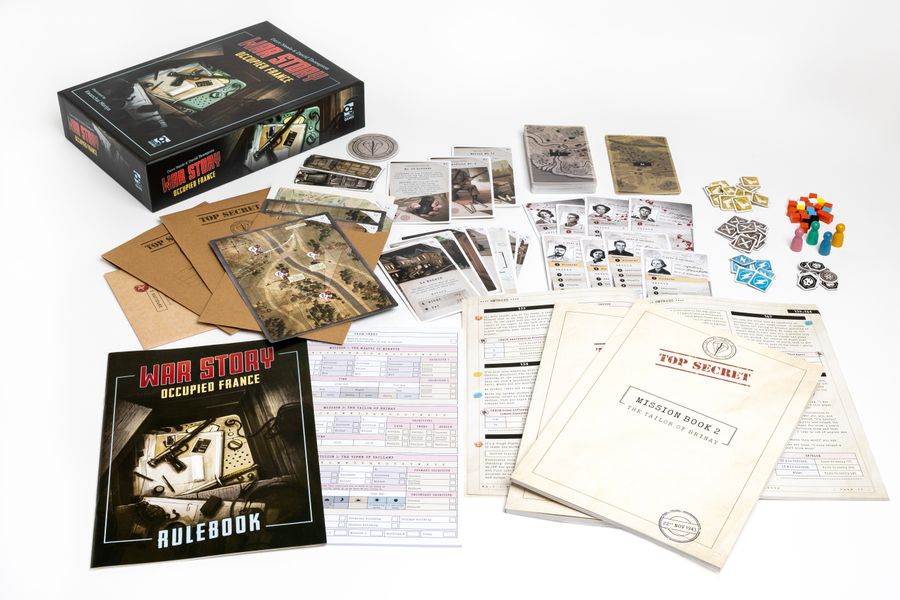A photo the board game box behind a spread of components including the rulebook, various mission briefings and mission books, cards and tokens. Photography by BoardGameShots.