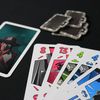 A players hand and intel tokens they've won.