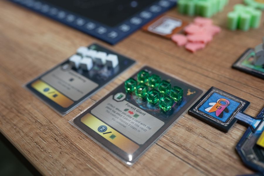 Collision Point game setup showing main board and action board