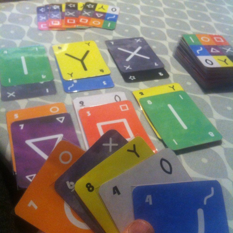 Holistic: quint sequencing card game
