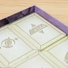 Welcome To The Moon - The game comes with six tuck boxes to separate components