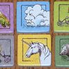The 6 Transportation Tiles from Elfenland, clockwise from top left: Dragon, Magic Cloud, Elf-cycle, Giant Pig, Unicorn, Troll Wagon