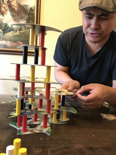 Game Preview: Menara, or Counting Colored Columns to Climb Consistently