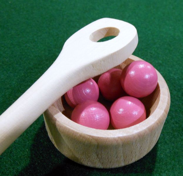 Close up of components - mixing bowl, spoon, and "ingredients"
