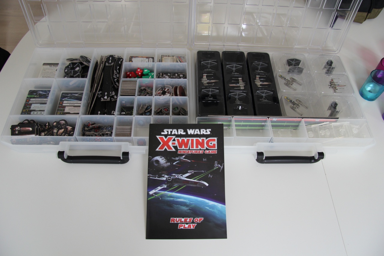 Storage! Wife bought me an awesome tackle box for storage, as well as the  two core, heroes of the resistance and Slave 1. She's the best. : r/XWingTMG