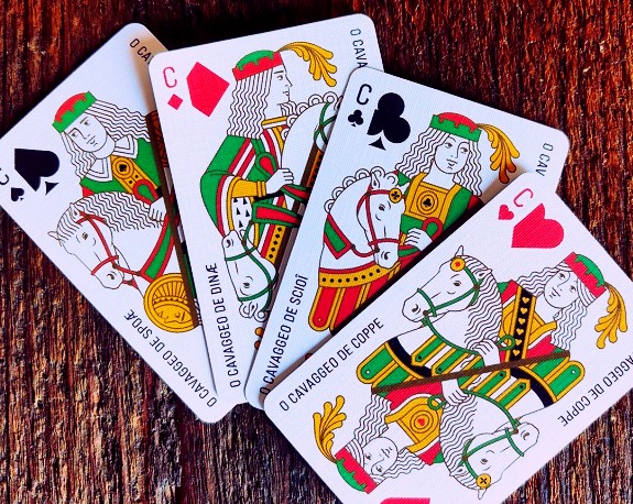 Create an artistic representation of a royal flush, the highest-ranking  hand in poker, using vibrant colors and intricate details. showcase the  five cards (ace, king, queen, jack, and ten) from a single