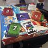 Red 7 is an excellent travel game, as it can be played nearly anywhere. And if your airport waiting area has no table, you can always use another board game as a table! This is in St Kitts airport in Caribbean.