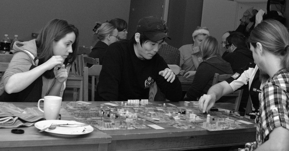 Playing this game (Terra Mystica) demands focus and discusions — Photo by virre on BoardGameGeek