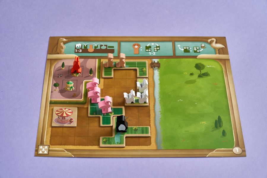 Player board with enclosures and animals