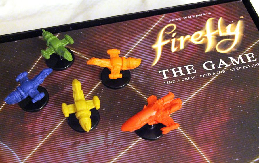 The 4 Firefly minis, and the Reaver mini (red).