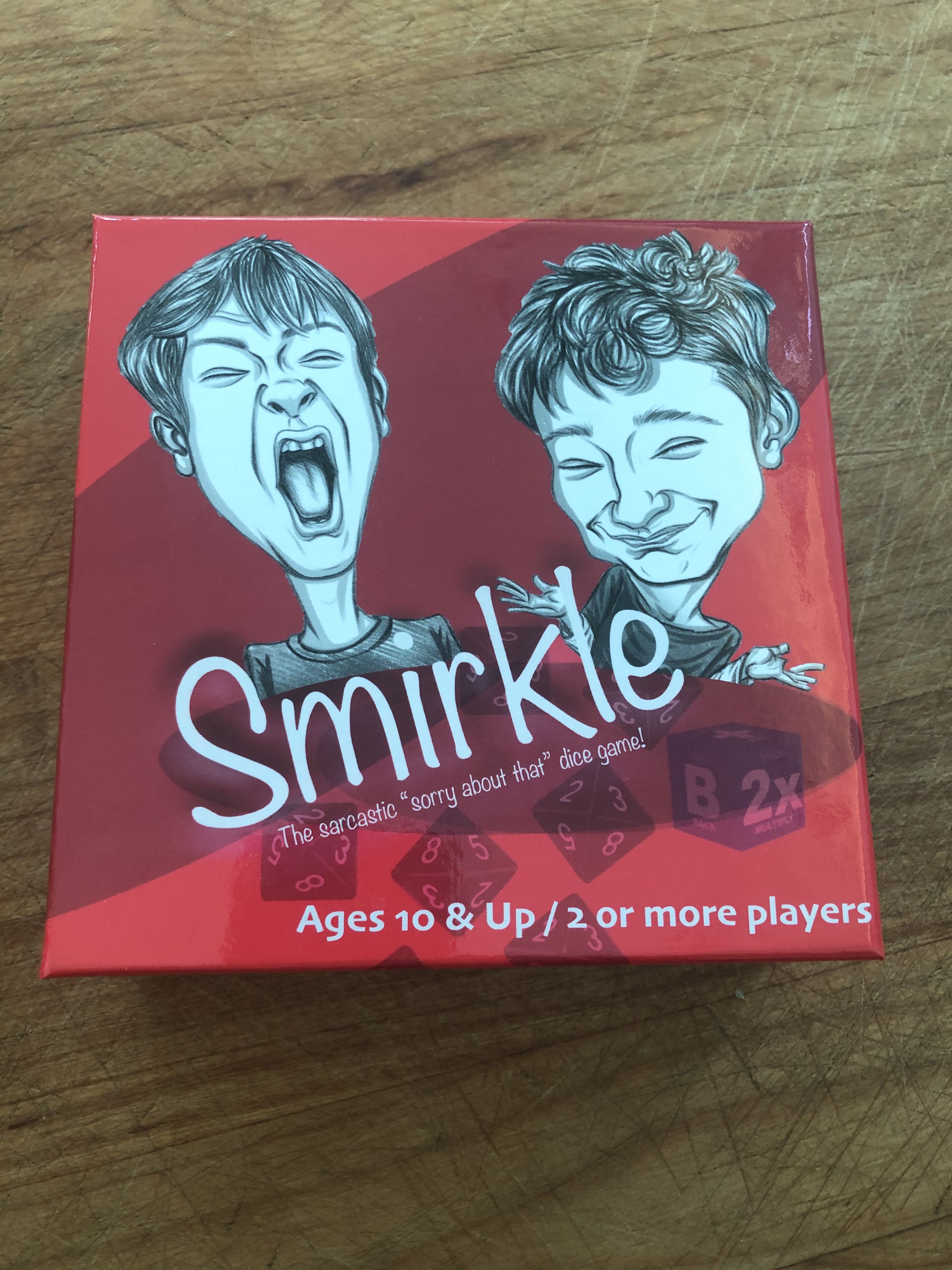 Smirkle: the saracastic "sorry about that" dice game