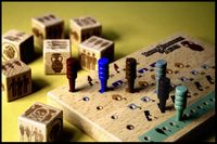Dice and player peg board for tracking goods and…