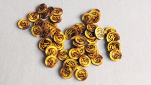 Djinn: InMyBox UV printed coins on plywood