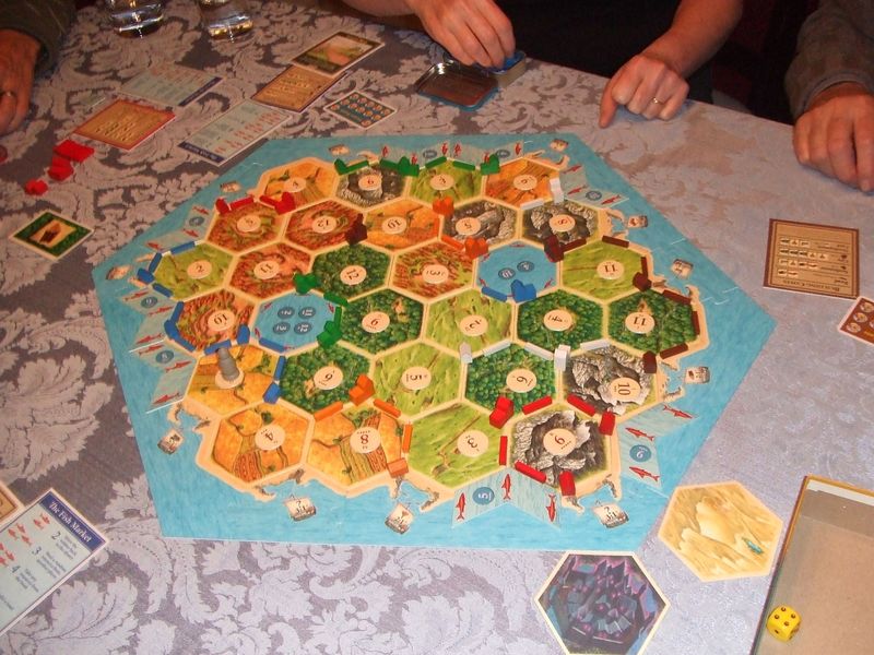 Traders and Barbarians: Fishermen of Catan with 6 players and the extremely powerful lakes. Green won with a victory point card bought with fish.